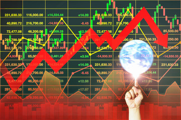 Business down manipulated control on investment of global stock market with finger spining earth on stock index candlestick  chart data  for report and presentation background.by NASA.