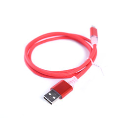 Fototapeta premium Red USB cable for smartphone charge isolated on white background.