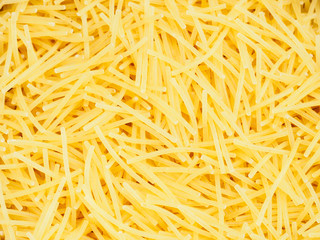 Background from small pasta. Healthy eating concept