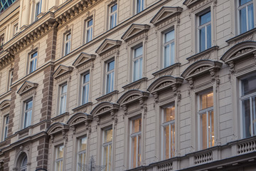 Windows in old european buildings. Cityscape for tourism