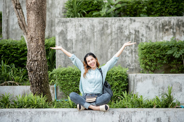 Happy young Asian University student.