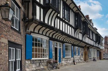 Fototapeta na wymiar Medieval half-timbered buildings at the Minster Yard, Vicar Lane, York, UK