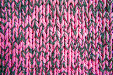 Pink and grey knitted (knitting) woolen fabric texture