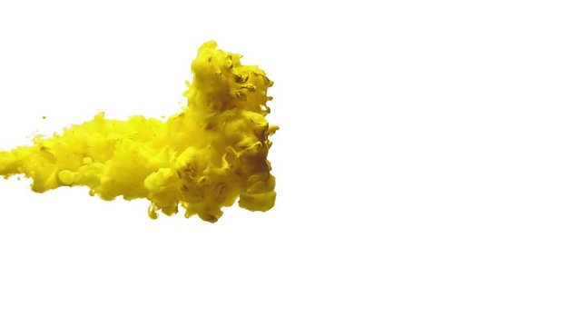 Yellow ink in water on white background, slow motion splash.