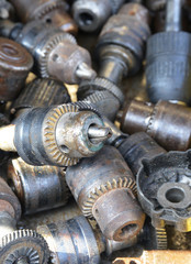 old  iron industrial tools on a background