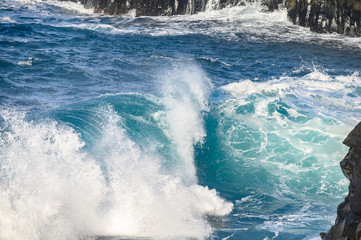 Dangerious ocean stormy waves hits black lava rocks on La Palma island, Canary, Spain