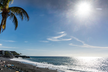 Black lava sand beach in Puerto Naos, La Palma, Canarian islands, Spain