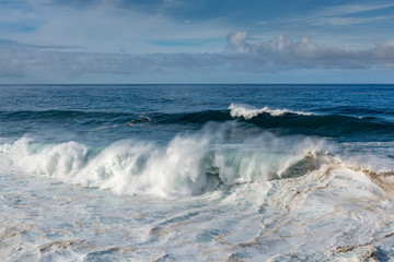 Dangerious ocean stormy waves hits black lava rocks by Faro de las Hoyas, La Palma island, Canary, Spain