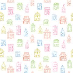 Seamless pattern with cute houses in doodle style. Colorful houses painted by hand on a white background.