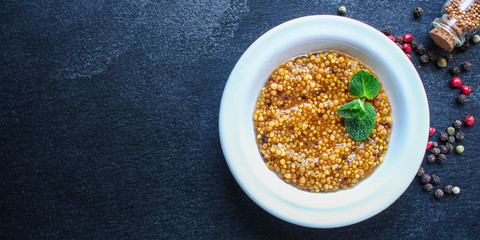 mustard cereal sauce (French or Dijon recipe) menu concept. background. top view. copy space