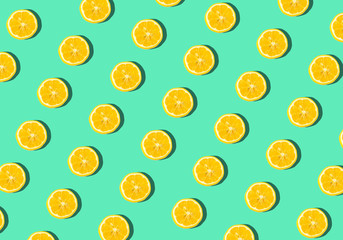 Summer and vitamins background. Lemon on a blue background, minimal food concept