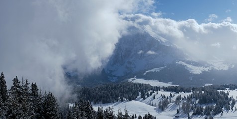 Alpine landscape with snowy mountain peaks