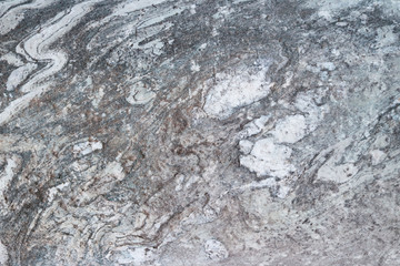 The plate is made of marble in black and white shades. Smooth texture for design and decoration. Natural building material. Natural patterns on the stone. Plates for floor and walls