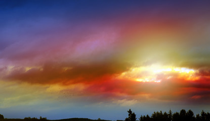 Obraz na płótnie Canvas Colorful sunset sky with big clouds. Nature background.