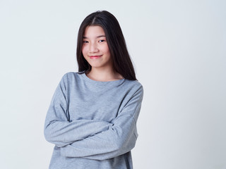 Obraz premium Smiling young woman over white background