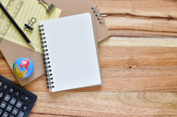็High angle view, White paper on wooden table for creative ideas notes with copy space. 