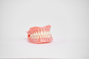 Dentures. Full removable denture. Isolate on white background