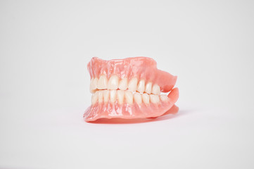 Dentures. Full removable denture. Isolate on white background
