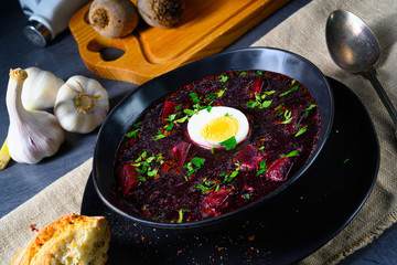 Delicious beetroot borscht with egg