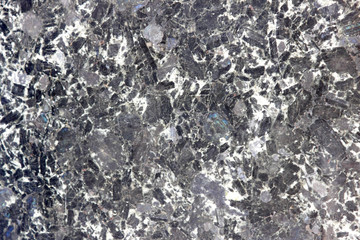 Black marble with small blue spots