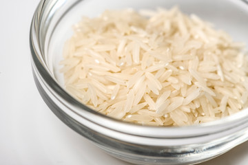 Plate of rice on white table