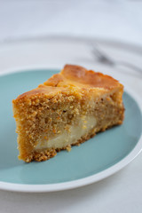 home made carrot cake cheesecake on a table