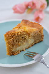 home made carrot cake cheesecake on a table