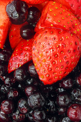 strawberries on black background