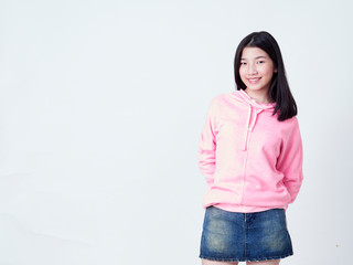 Smiling young woman over white background