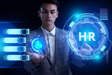 Business, Technology, Internet and network concept. Young businessman working on a virtual screen of the future and sees the inscription: