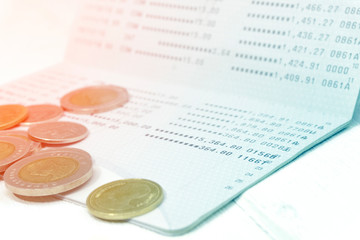 Coins and statement book bank account of double exposure for finance and banking concept