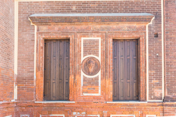 Venice. View of Venice Streets and buildings. Colorful Old Authentic Bricks Building in Venice: doors, windows. Architecture details of Ancient Italian city. Travel Tourism Concept. 