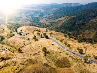 the aerial above landscape of a dry mountain. And the forest that has been destroyed becomes agriculture, farmland In the countryside of Thailand.