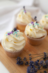 cupcakes with frosting and sprinkles