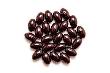 Chocolates in chocolate glaze isolated on white