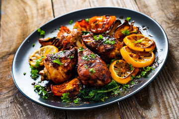 Barbecue chicken drumsticks with roast vegetables