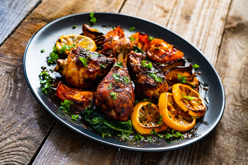 Barbecue chicken drumsticks with roast vegetables
