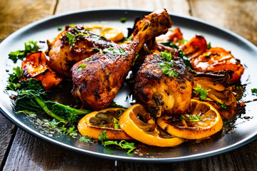 Barbecue chicken drumsticks with roast vegetables