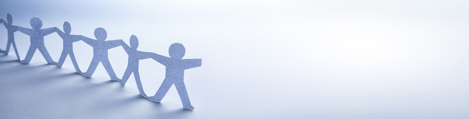 Human team of paper chain people.