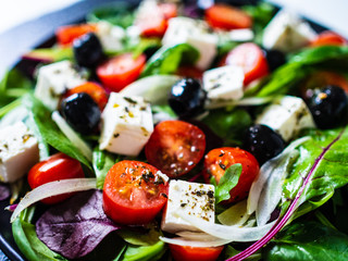 Fresh greek salad - feta cheese, tomato, lettuce, black olives and onion