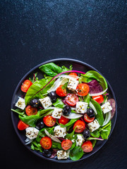 Fresh greek salad - feta cheese, tomato, lettuce, black olives and onion