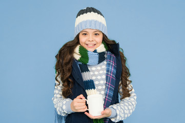 Hot beverage. Idea for warming. Happy girl hipster. Kid winter fashion. Child warm knitwear. Baby...