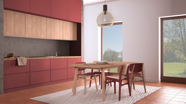 Cosy red and wooden kitchen with dining table and chairs, carpet and pendant lamp, panoramic windows, garden meadow, tree, terracotta tile floors, contemporary interior design