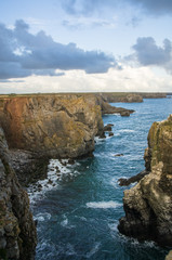 Rocky coast and blue sea in Pembrokeshire Coast National Park Wales United Kingdom UK