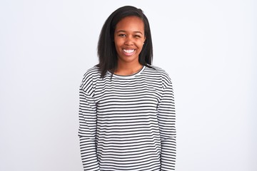 Beautiful young african american woman wearing winter sweater over isolated background winking...