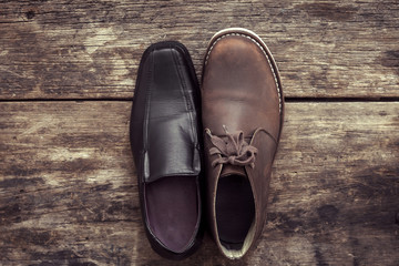 The decision between boots or leather shoes.