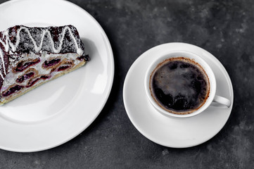 coffee and cake winter cherry in a white plate with copy space for your text. breakfast concept