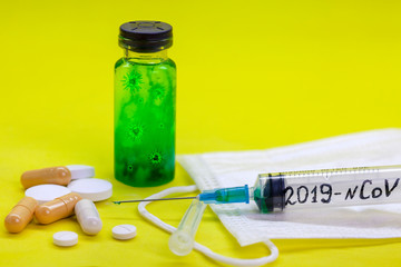 Concept of coronavirus quarantine. MERS-Cov (middle East respiratory syndrome coronavirus), Novel coronavirus (2019-nCoV), test tube with coronovirus in a chemical laboratory, on a yellow background