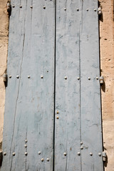 Old  stone house with  wooden shutters, Provence, France.