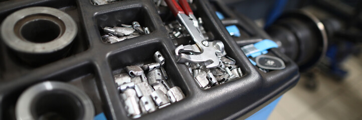 Focus on different fixing pieces of automobile details and tools used for damaged bits removal and...